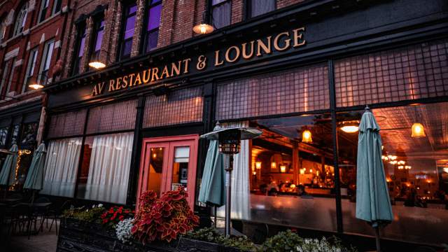 AV Restaurant exterior with warm lighting and elegant interior style in Scranton, PA.