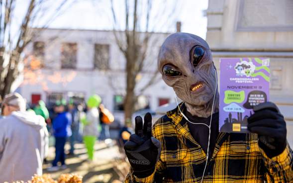 A man dressed as an alien at the Carbondalien Festival in Carbondale, PA