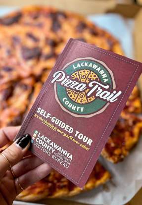 Pizza_Trail_Passport_Vince_the_Pizza_Prince_2023_Smith_01_LCVB