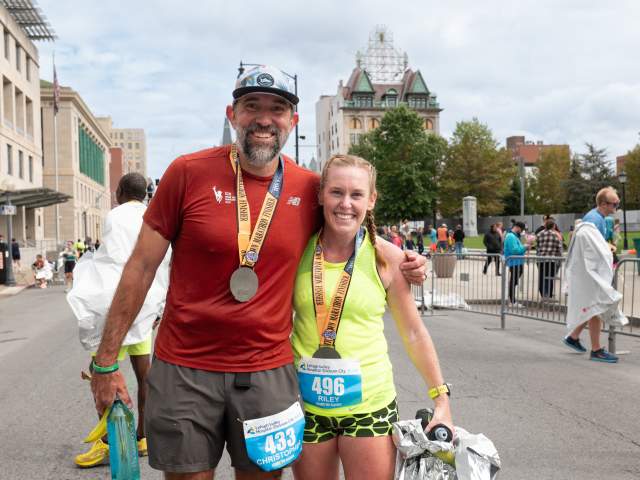 Finishing runners posing for a photo after the Steamtown Marathon in Downtown Scranton, PA
