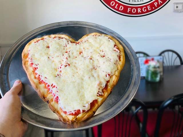 A heart-shaped pizza at Mary Lou's Pizza in Old Forge, PA
