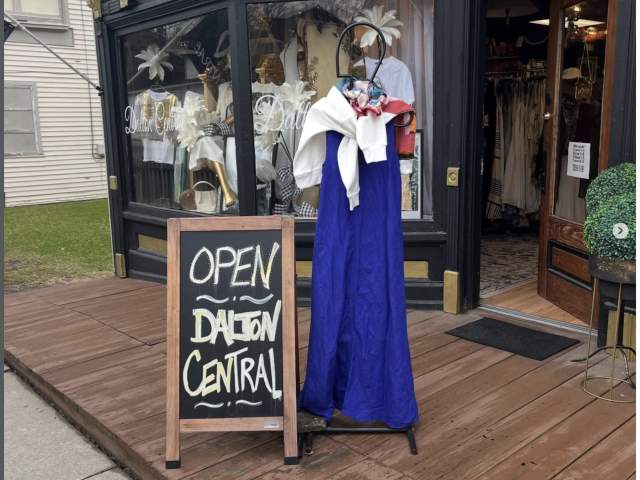 A mannequin and a sign in front of Dalton Central, a boutique store, in Dalton, PA