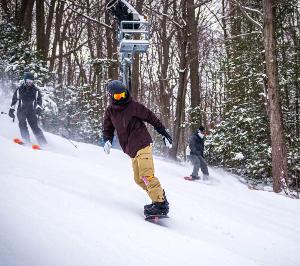 People snowboarding at Montage Mountain Ski Resort