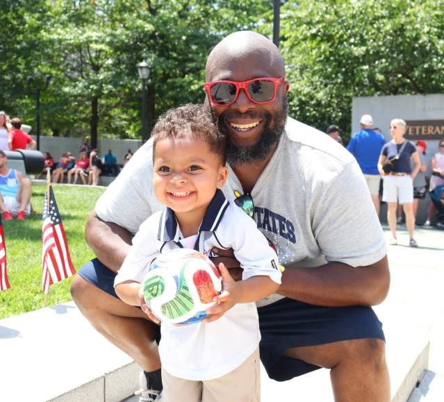 A father and son at the World Cup Fan Zone in Downtown Scranton, PA