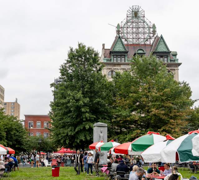 Italia-colored umbrellas at La Festa Italiana underneath the Electric City Sign in Scranton PA