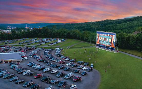 An aerial view of the Circle Drive-In Theater's parking lot and movie screen in Dickson City, PA