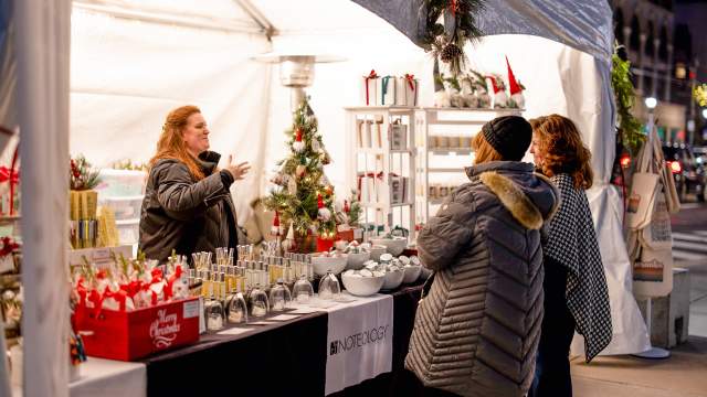 Women shopping at a vendor at the Lackawanna Winter Market in downtown Scranton, PA