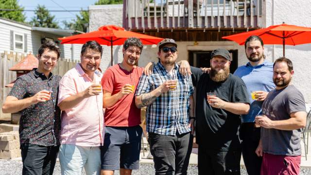 A group of friends at Electric City Ciderworks in Old Forge, PA