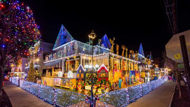 Christmas Lights House in Scranton, PA, corner view at night with festive holiday lights illuminating the house.