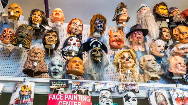 Costme masks on a wall display at Taney's Costume Shop in Scranton, PA