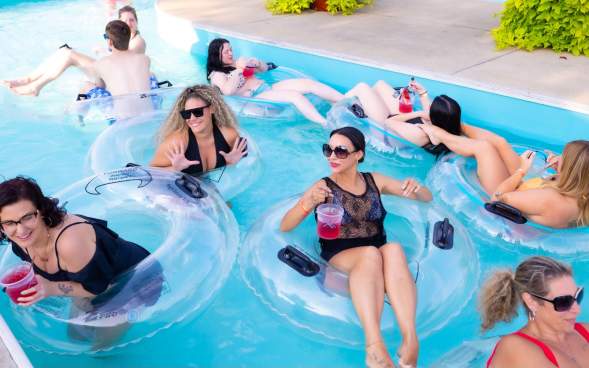 Guests floating in the Lazy Rivery during Adult Night at the Waterpark at Montage Mountain Resorts in Scranton, PA