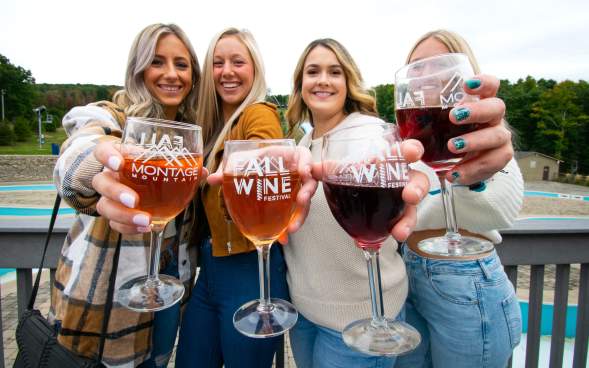 women holding wine glasses at Montage Mountain Fall Wine Festival