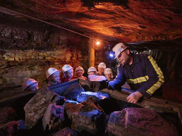 A group of kids on a tour at the Lackawanna Coal Mine Tour in McDade Park in Scranton, PA