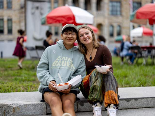 A couple posing for a photo at La Festa Italiana in Downtown Scranton, PA