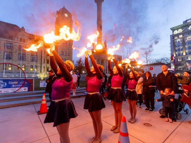 Performers twirling fire batons at Downtown On Ice in Downtown Scranton, PA