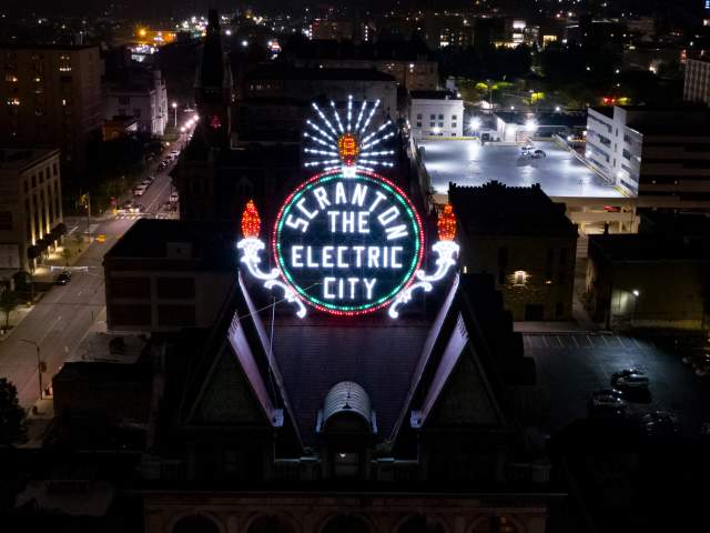 Electric City Sign at Lit Up at Night in Downtown Scranton, PA