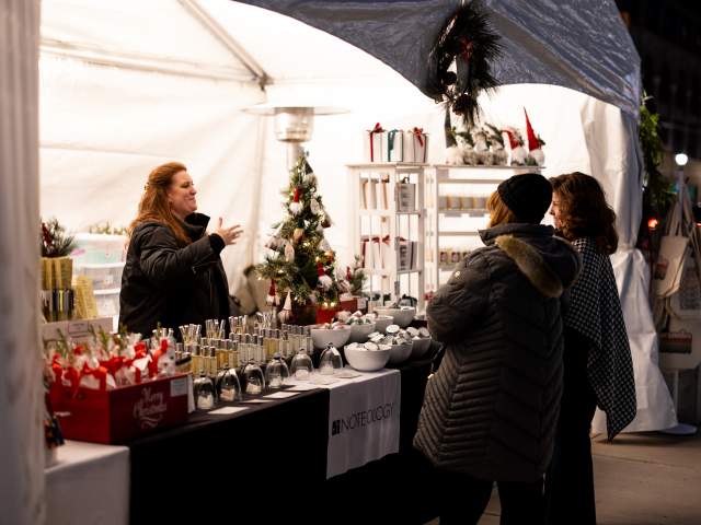 women shopping at a vendor at the Lackawanna Winter Market