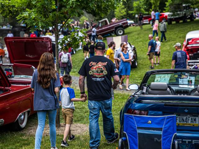 A family at the Villa Capri Father's Day Car Show