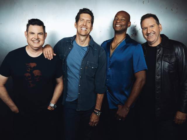 the band members of Better Than Ezra posing for a photo