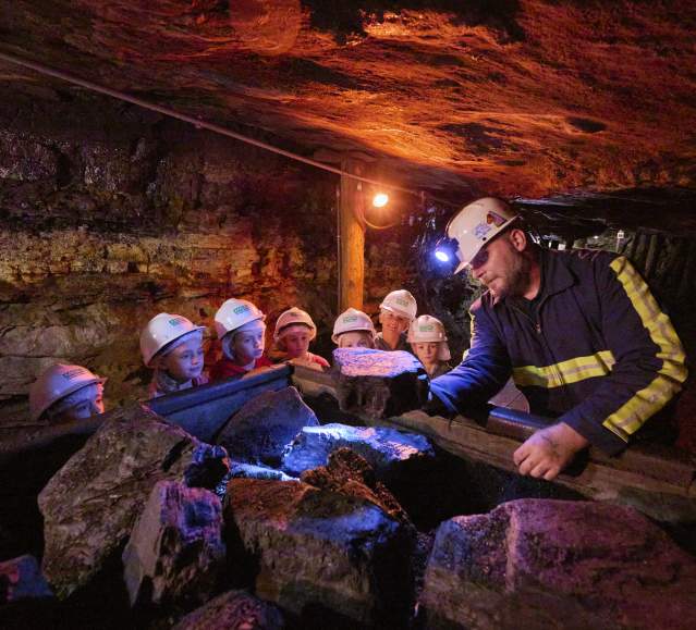 A group of kids on a tour at the Lackawanna Coal Mine Tour in McDade Park in Scranton, PA