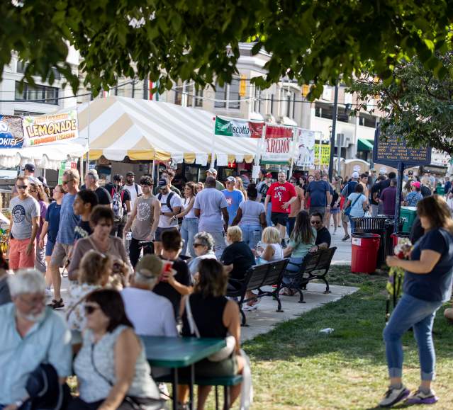 A crowd of people walking around Courthouse Square during La Festa Italiana in Downtown Scranton, PA