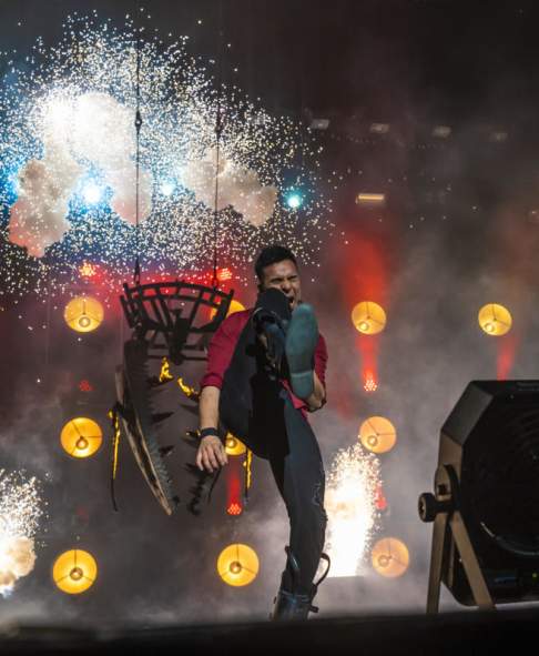 A performance photo of the Champions of Magic: Holiday Spectacular