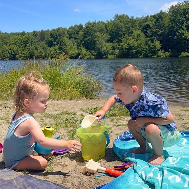 children playing in sand at Covington Park's beach