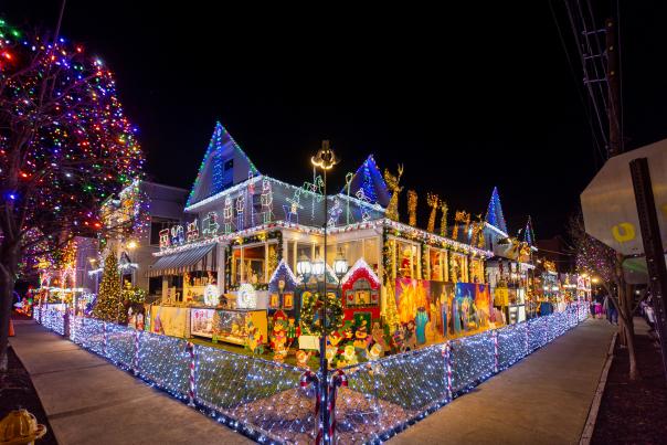 Christmas Lights House in Scranton, PA, corner view at night with festive holiday lights illuminating the house.