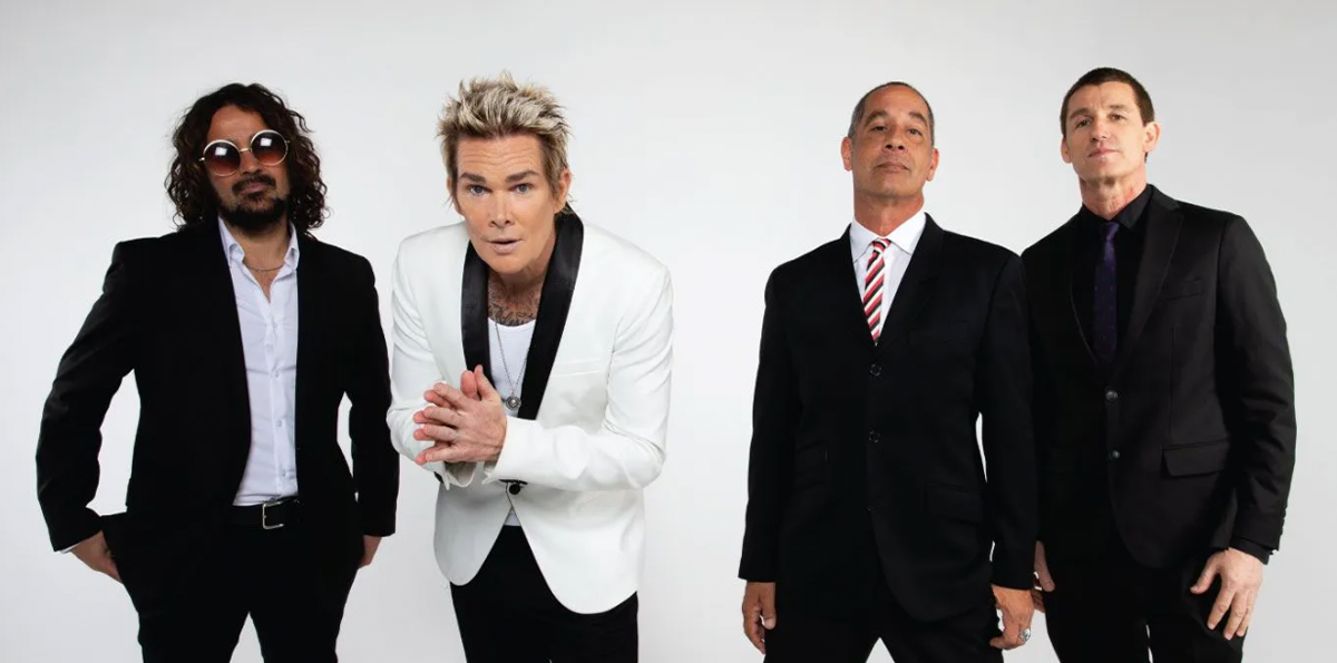 The band members of Sugar Ray posing for a photo