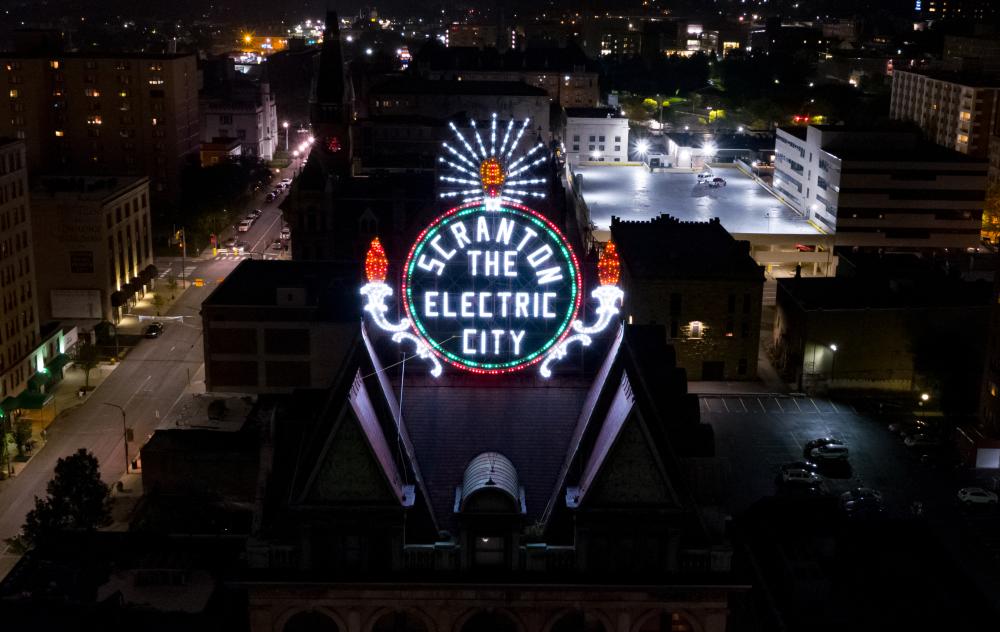 Electric City Sign at Lit Up at Night in Downtown Scranton, PA