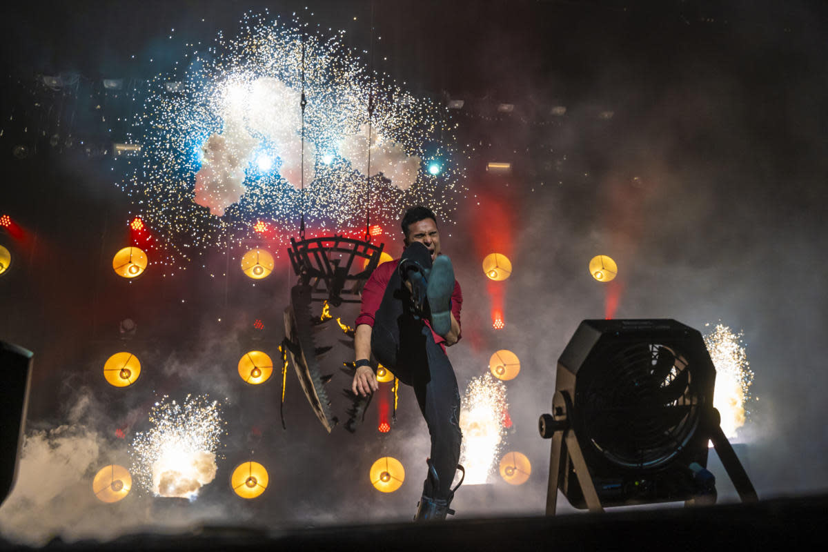 A performance photo of the Champions of Magic: Holiday Spectacular