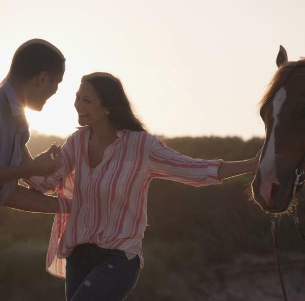 couple with a horse