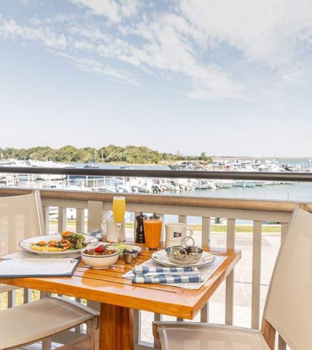table for two dining area with waterfront view