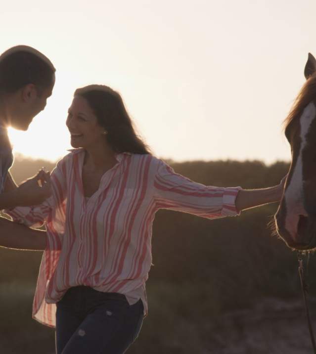 couple with a horse