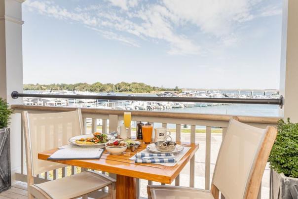 table for two dining area with waterfront view