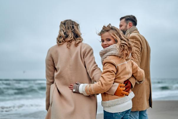 Family at beach in winter