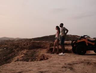 People Gazing Beside ATV