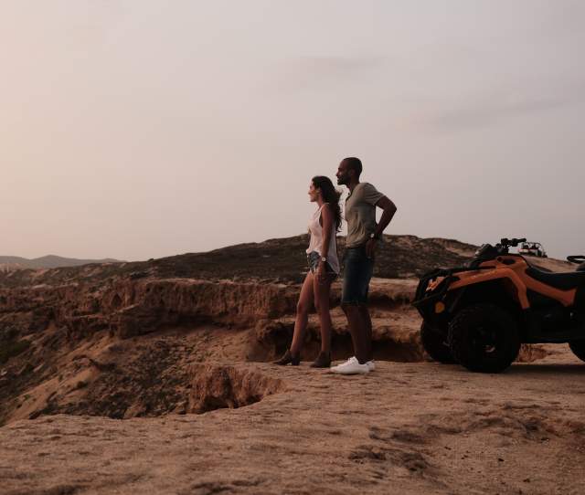 People Gazing Beside ATV