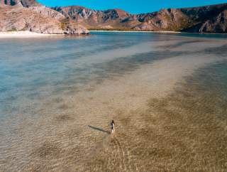 Woman in Water Aerial Photo