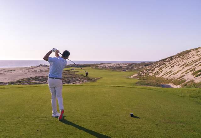 Male golfer making a great swing
