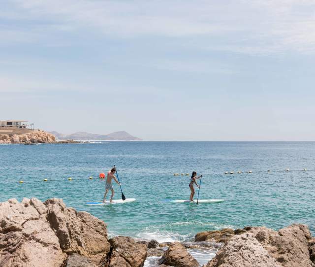 Chileno Beach Paddle Couple.jpg
