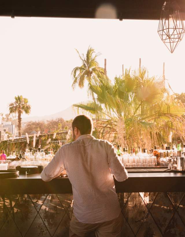 Man at Bar During Late Afternoon