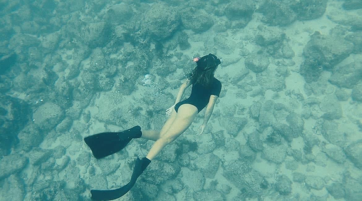 Woman snorkeling in the oceans of Los Cabos
