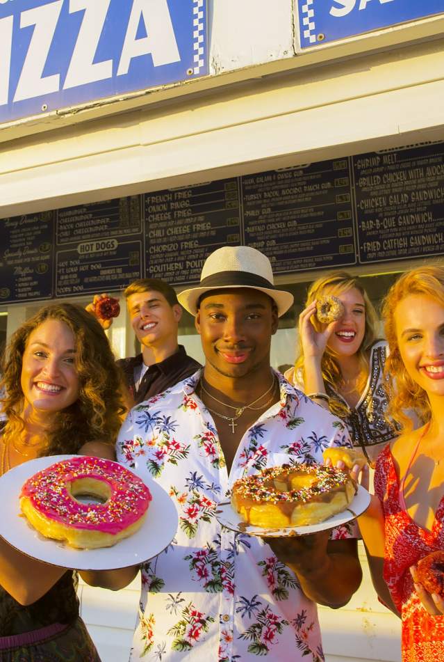Millennials eating donuts