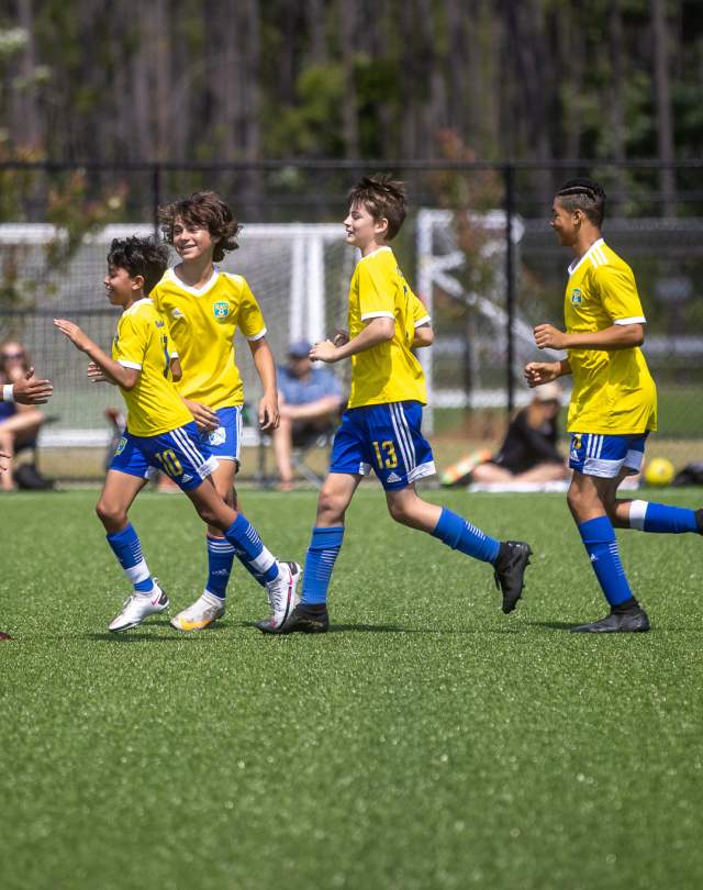soccer players on field