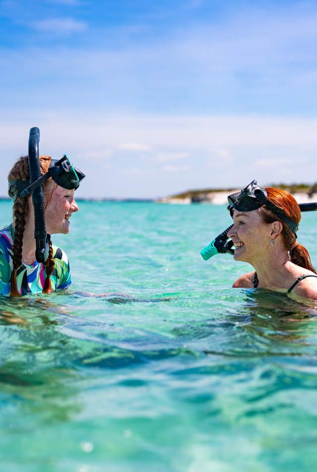 Snorkeling Mom and Daughter