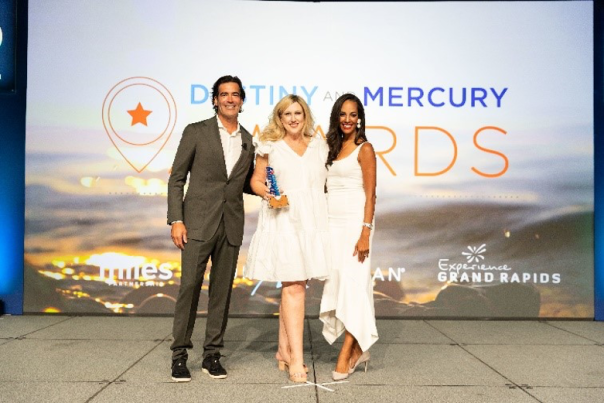 women accepting award