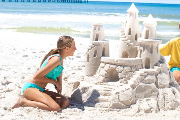 Kids with sandcastle