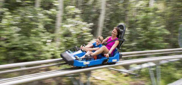 Mom and son on alpine coaster at Park City Mountain