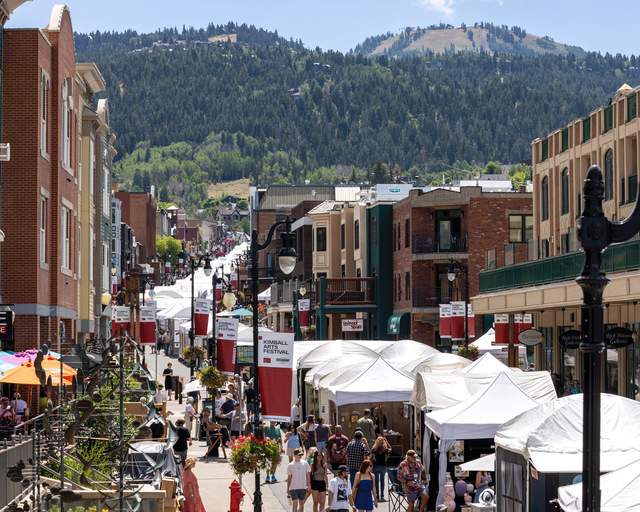 Kimball Arts Festival booths lining Main Street Park City on sunny day